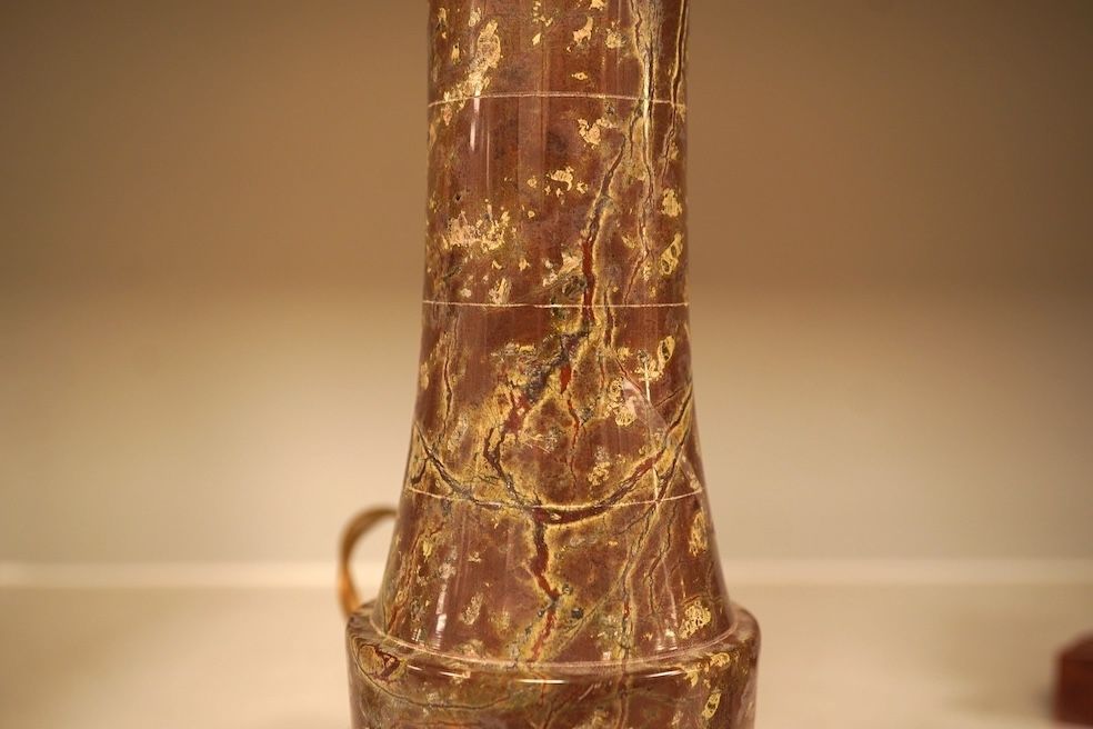 A serpentine lamp modelled as a lighthouse, 34cm high